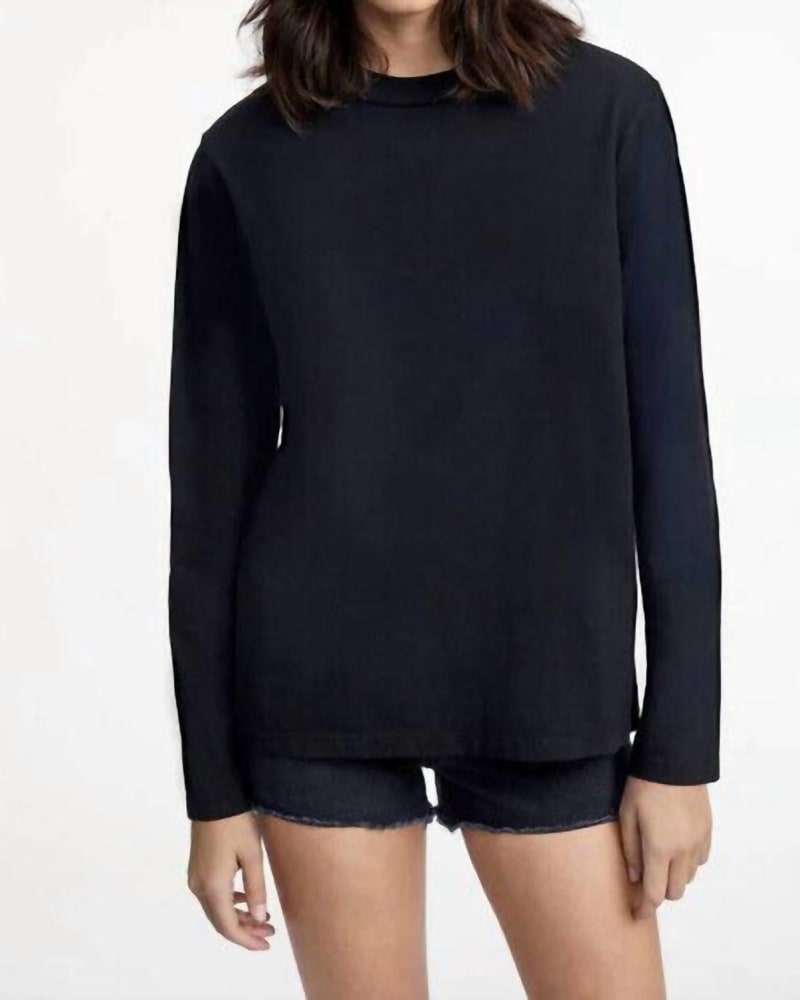 Front of a model wearing a size L 50S Long Sleeve Tee in Black in Black by RE/DONE. | dia_product_style_image_id:332352